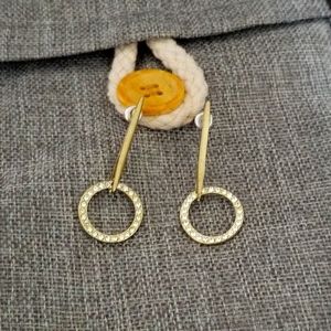 Gold circle drop earrings